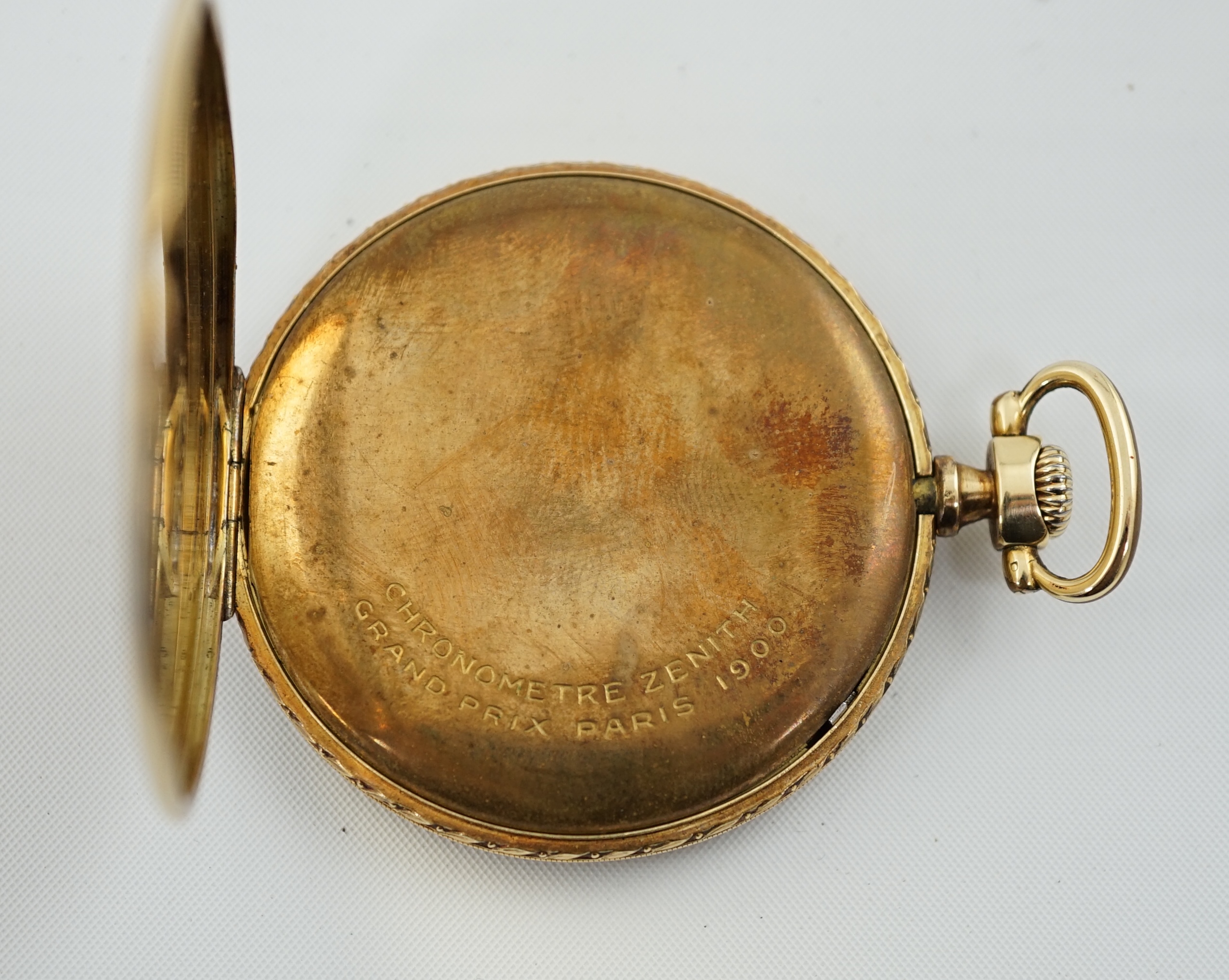 A Zenith 14K gold open faced keyless dress pocket watch